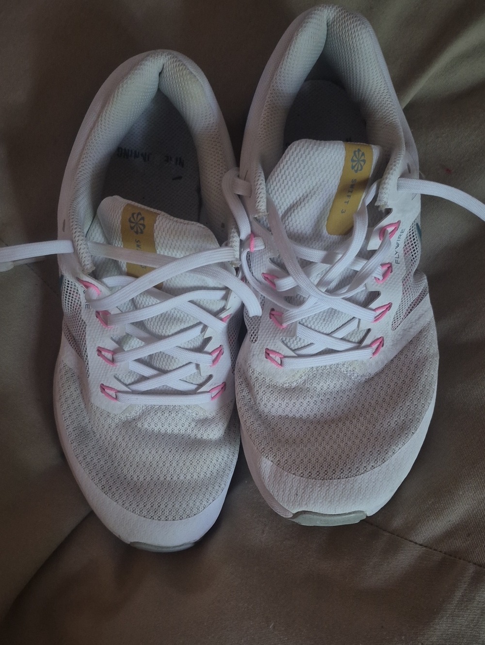 Nike Women's White Sneakers with Pink Accents